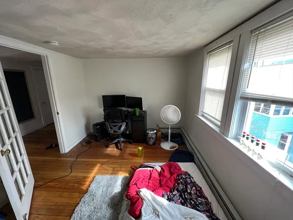 a kitchen that has a sink and a stove in it