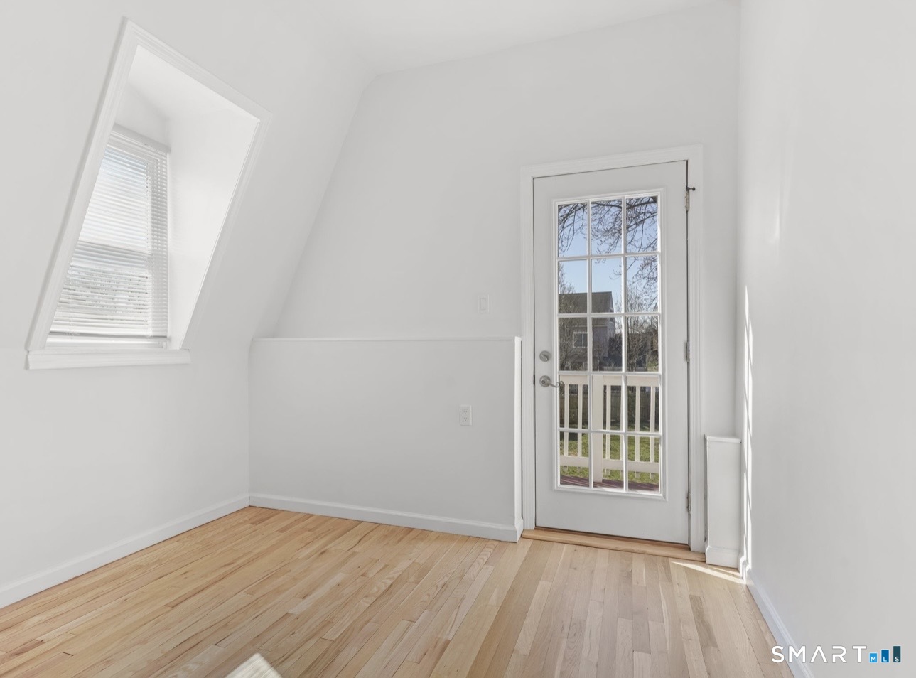 709 Tunxis Hill Road Fairfield, CT 06825 - Photo 12 of 31 Primary bedroom; door to private balcony