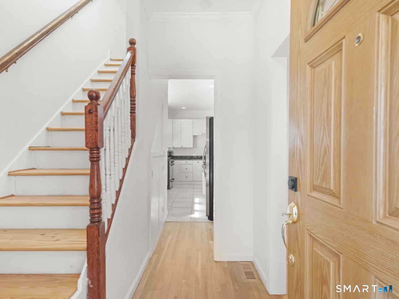 709 Tunxis Hill Road Fairfield, CT 06825 - Photo 10 of 29 Front entry; stairs to upper level