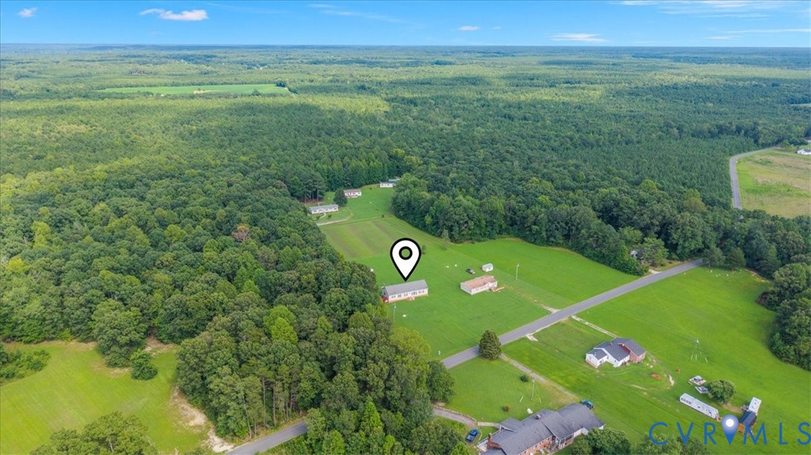 28231 Lewis Moore Road Ruther Glen, VA 22546 - Photo 46 of 50 a view of an outdoor space and a yard