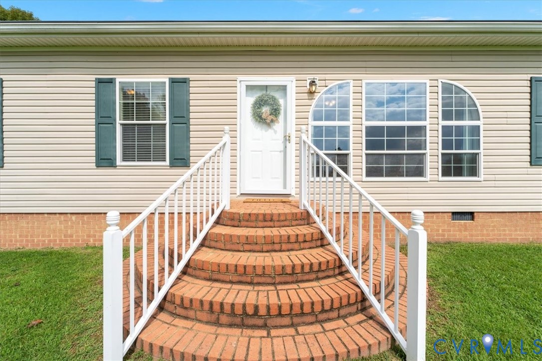 28231 Lewis Moore Road Ruther Glen, VA 22546 - Photo 9 of 50 a view of a balcony with stairs