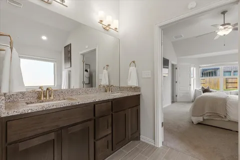 a white bath tub sitting next to a bathroom