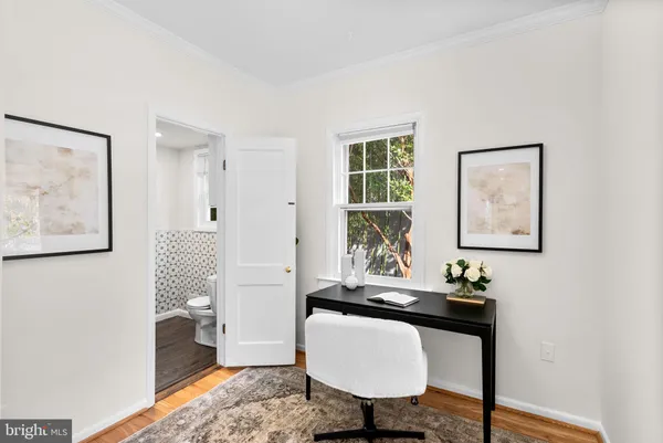 a living room with furniture and window