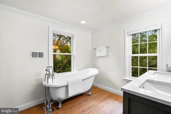 a living room with a window and a table