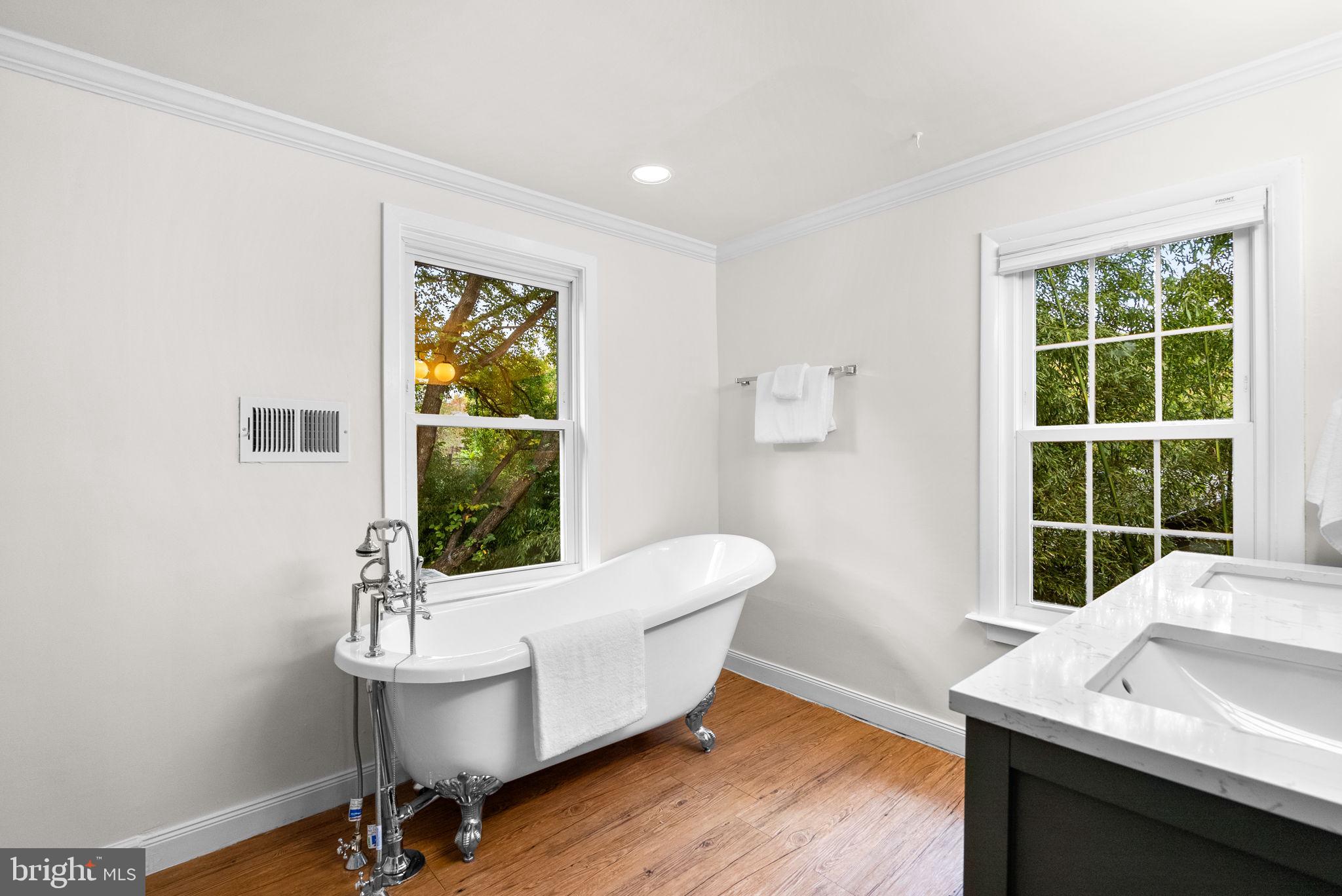725 Silver Spring Avenue Silver Spring, MD 20910 - Photo 20 of 41 a living room with a window and a table