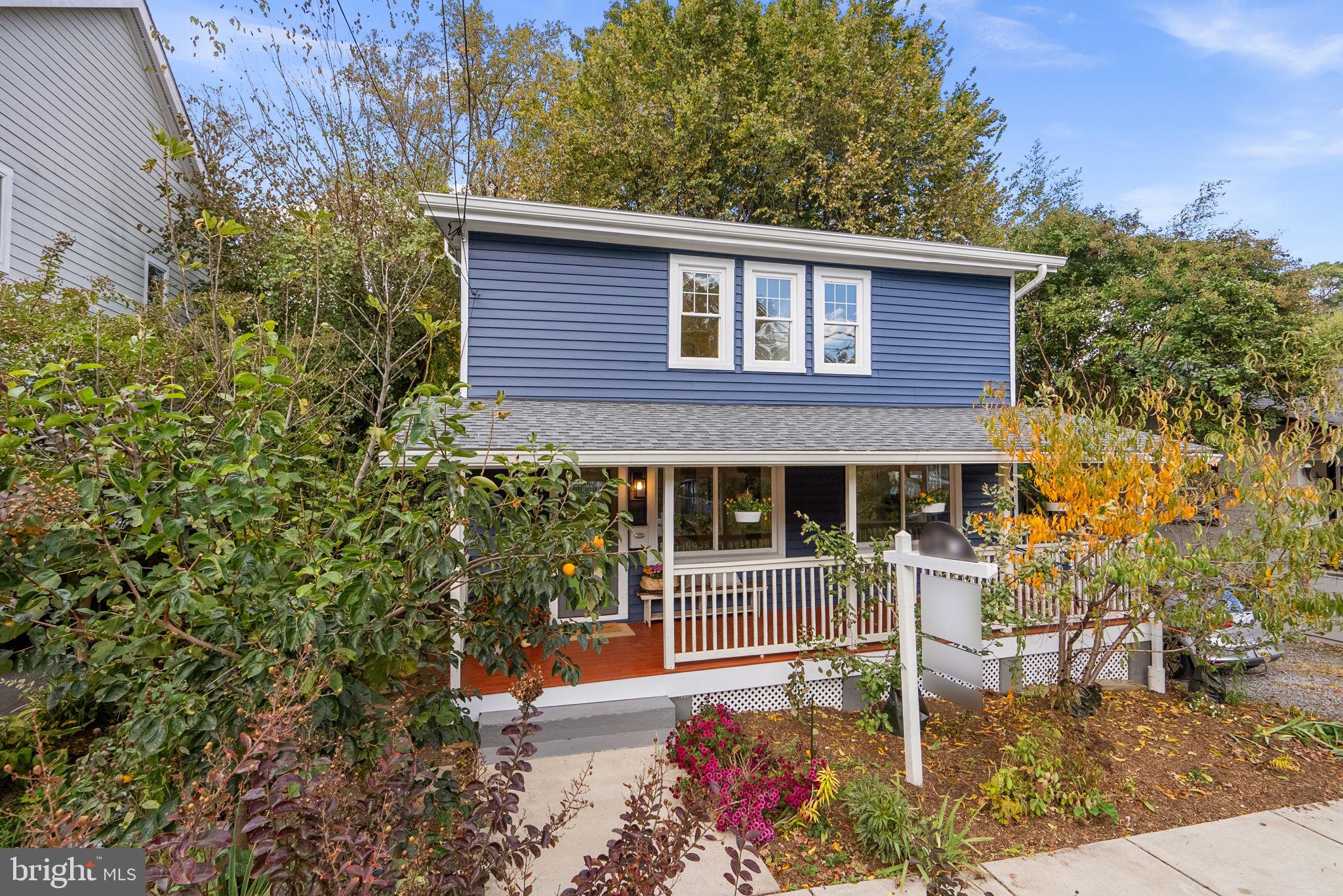 725 Silver Spring Avenue Silver Spring, MD 20910 - Photo 2 of 41 a front view of a house with garden