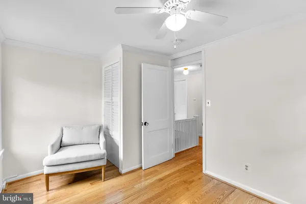 a view of a livingroom with furniture and wooden floor