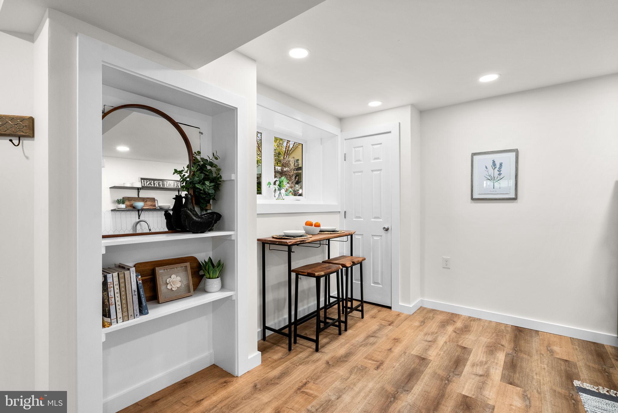 725 Silver Spring Avenue Silver Spring, MD 20910 - Photo 26 of 41 a view of a livingroom with furniture and a kitchen