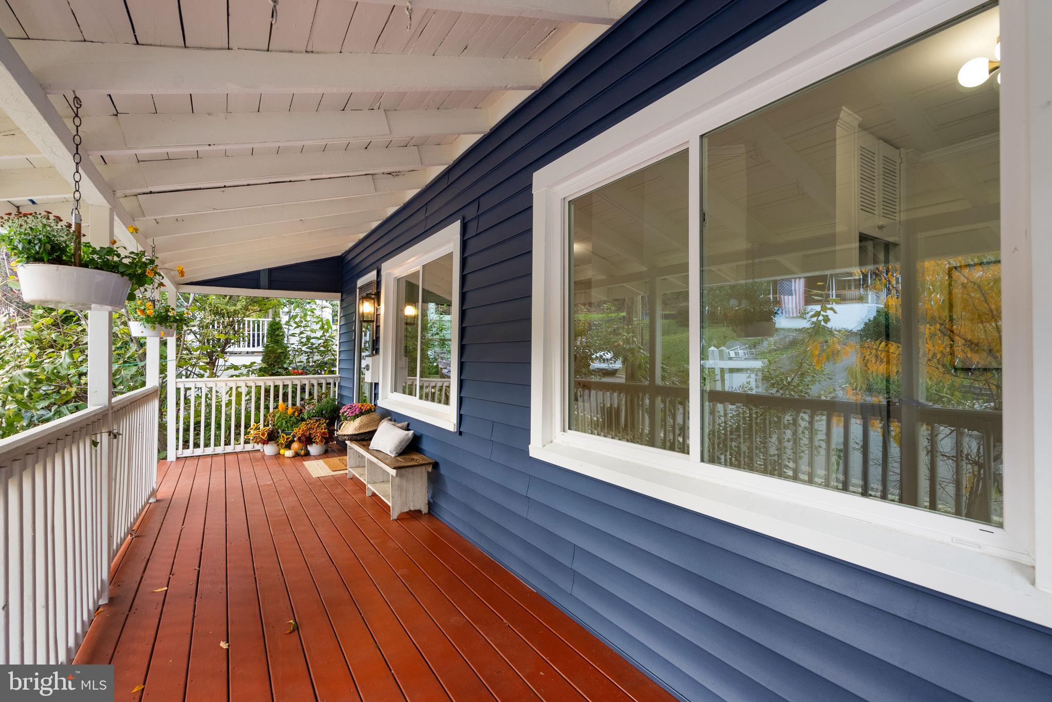 725 Silver Spring Avenue Silver Spring, MD 20910 - Photo 5 of 41 a view of a balcony with wooden floor