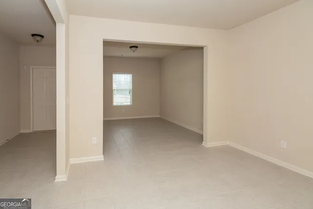 wooden floor and window in a room
