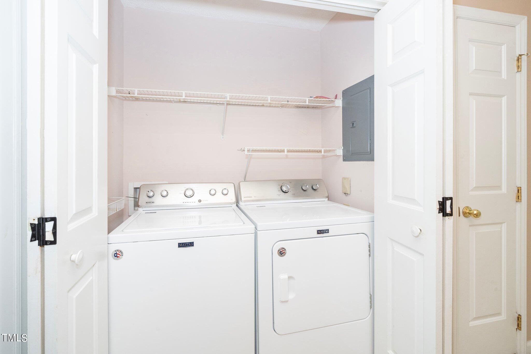604 Broad Leaf Circle Raleigh, NC 27613 - Photo 15 of 23 a utility room with dryer and washer