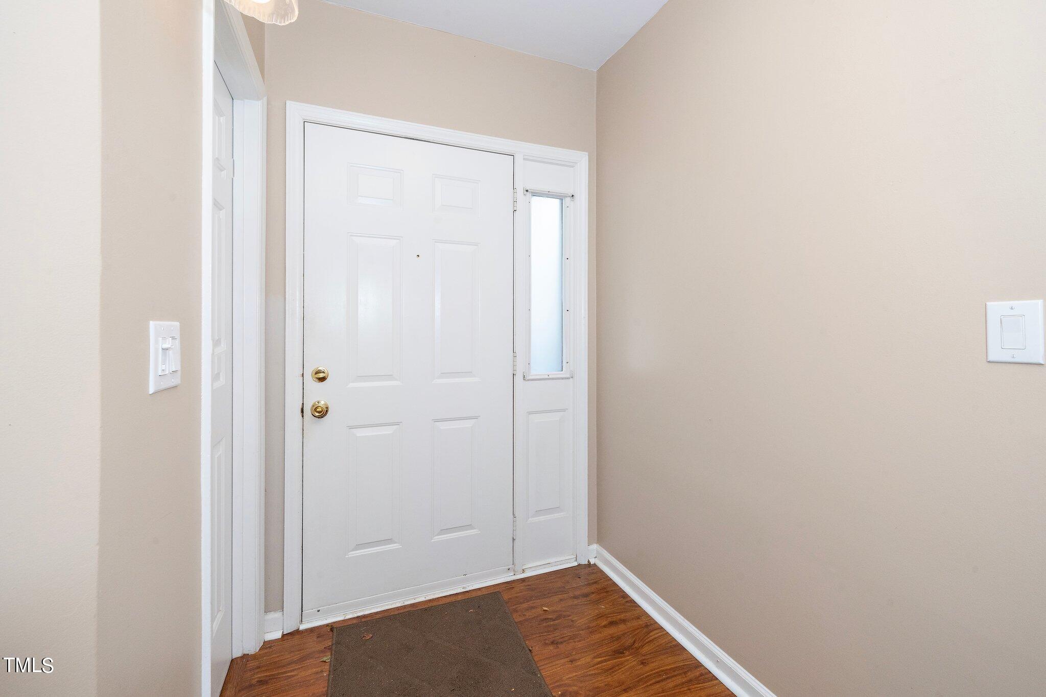 604 Broad Leaf Circle Raleigh, NC 27613 - Photo 3 of 23 a view of a hallway with closet