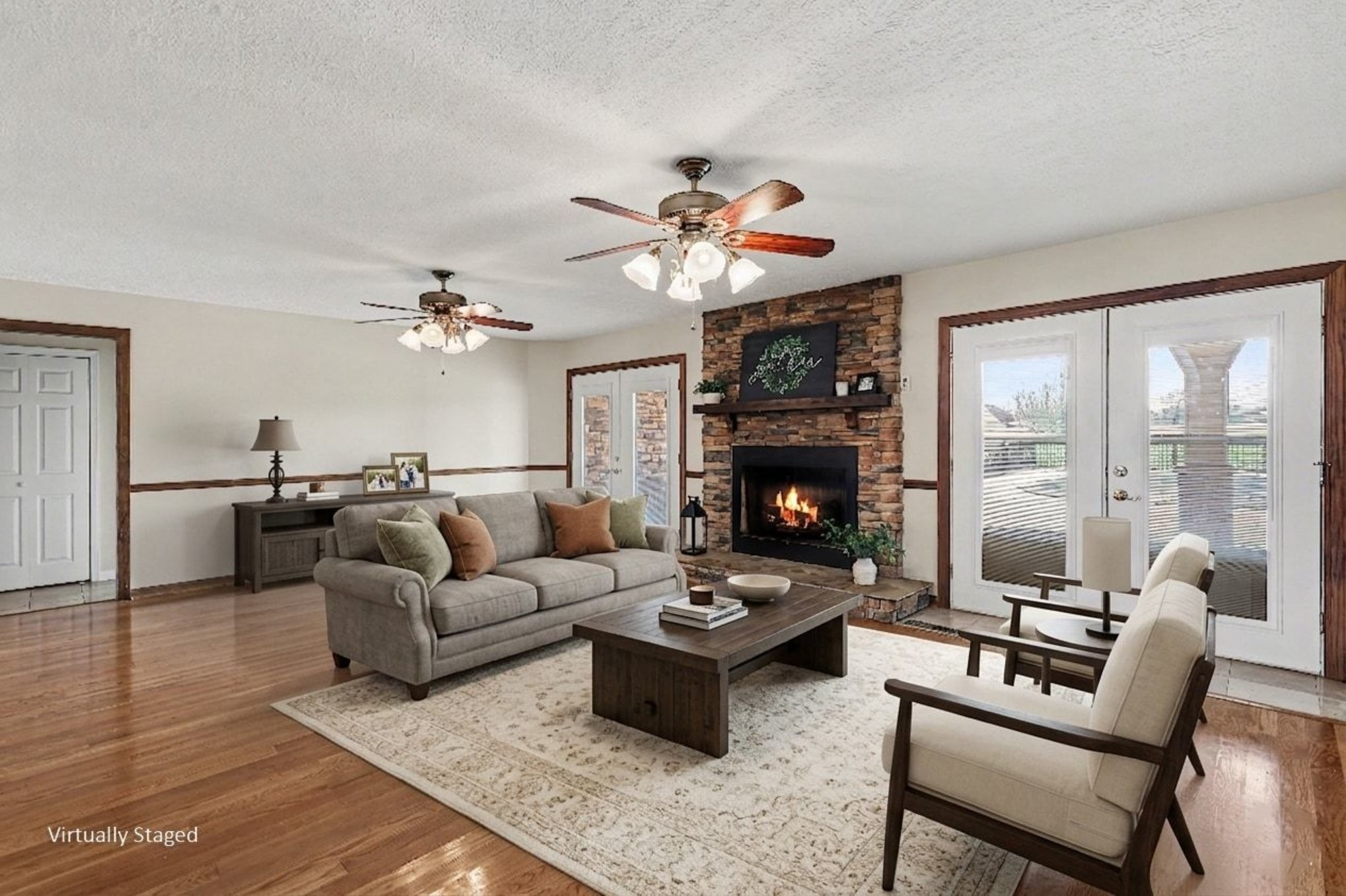 863 Rock Springs Road Castalian Springs, TN 37031 - Photo 11 of 36 a living room with furniture a table and a fireplace