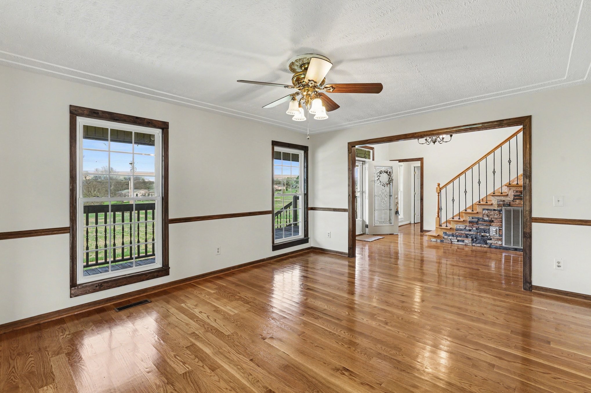 863 Rock Springs Road Castalian Springs, TN 37031 - Photo 17 of 36 a view of an empty room with window and wooden floor