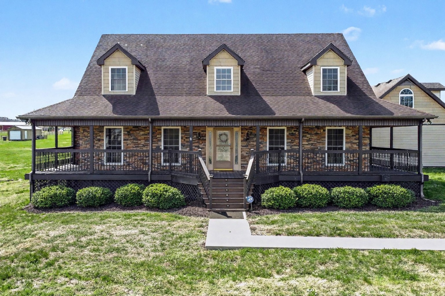 863 Rock Springs Road Castalian Springs, TN 37031 - Photo 2 of 36 a front view of a house with a yard