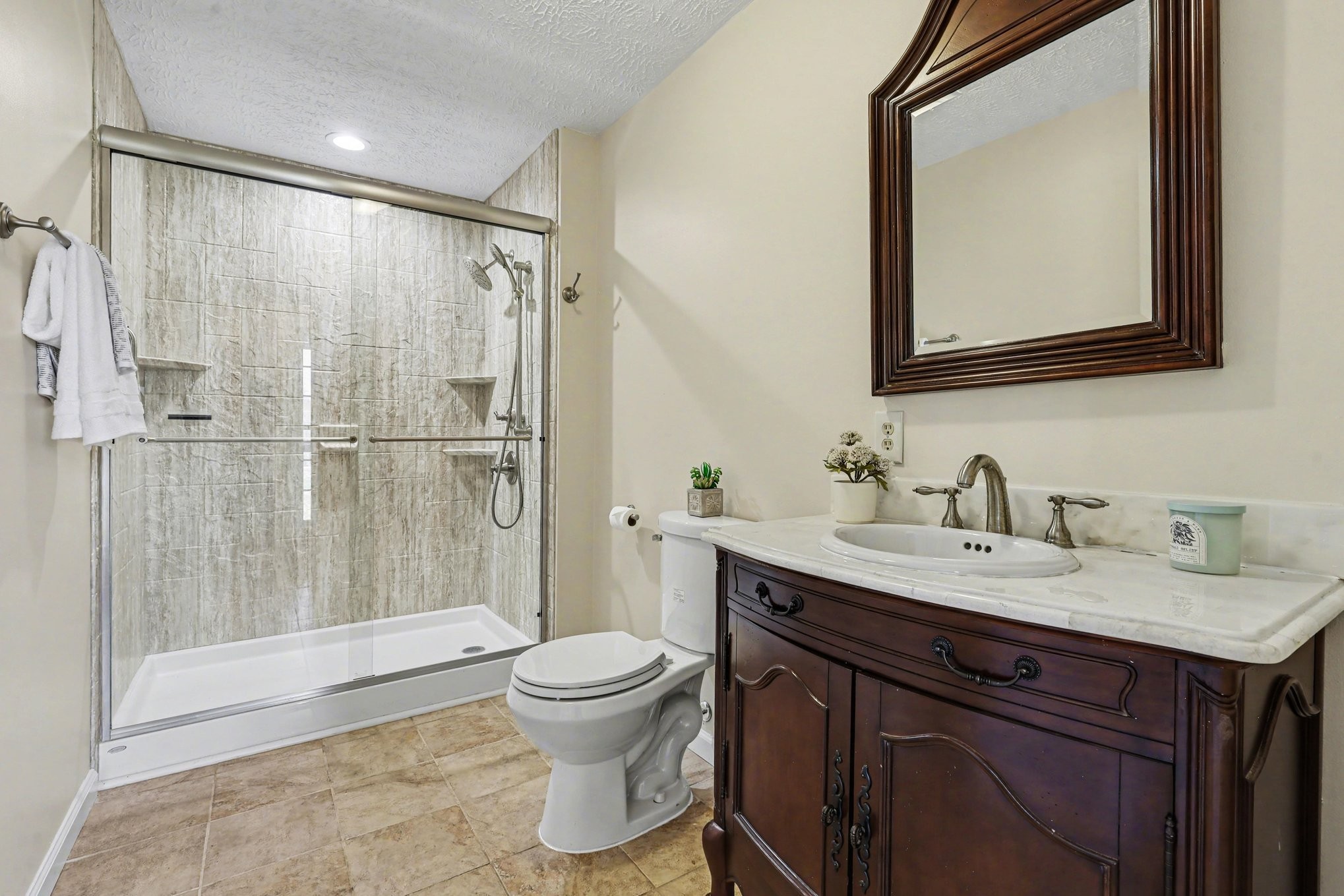 863 Rock Springs Road Castalian Springs, TN 37031 - Photo 22 of 36 a bathroom with a sink a toilet and shower