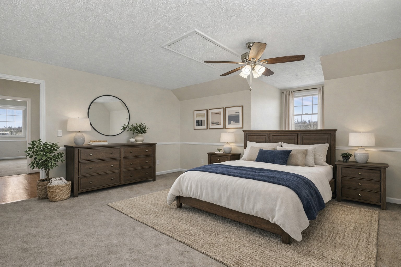 863 Rock Springs Road Castalian Springs, TN 37031 - Photo 25 of 36 a bedroom with a bed and a chandelier