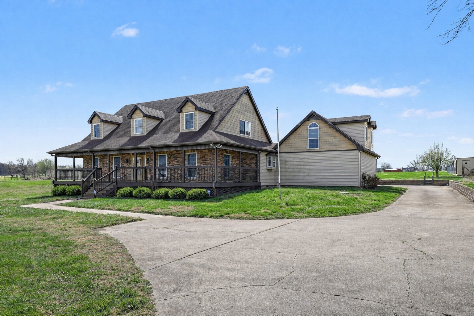 863 Rock Springs Road Castalian Springs, TN 37031 - Photo 5 of 36 a front view of a house with a yard and garage