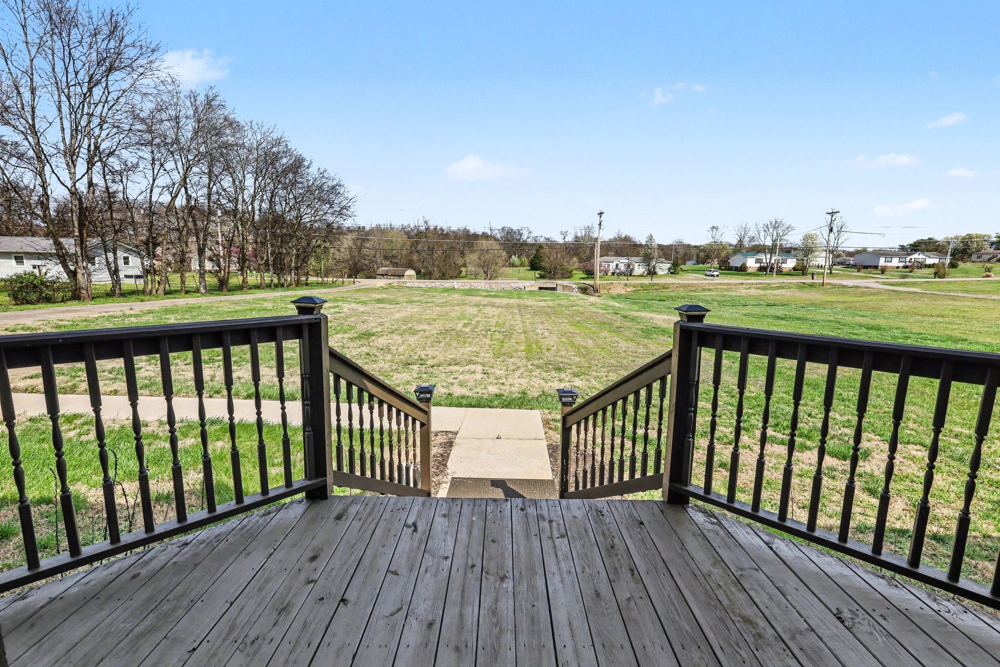 863 Rock Springs Road Castalian Springs, TN 37031 - Photo 7 of 36 a view of balcony with wooden floor