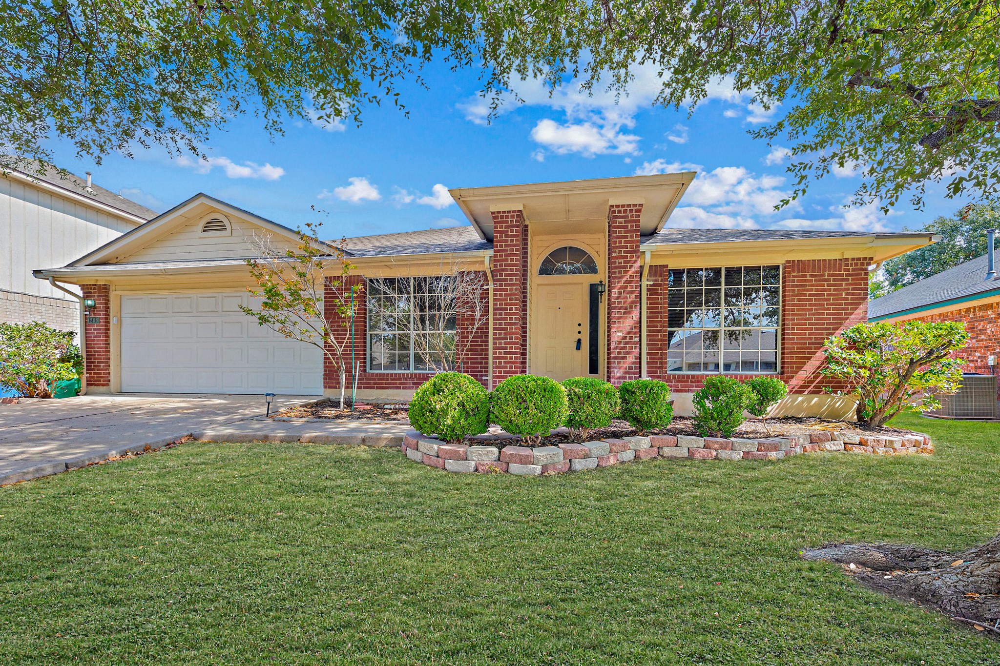 1208 Lochaline Loop Pflugerville, TX 78660 - Photo 3 of 40 Beautiful Curb Appeal Note: Grass has been digitally enhanced.