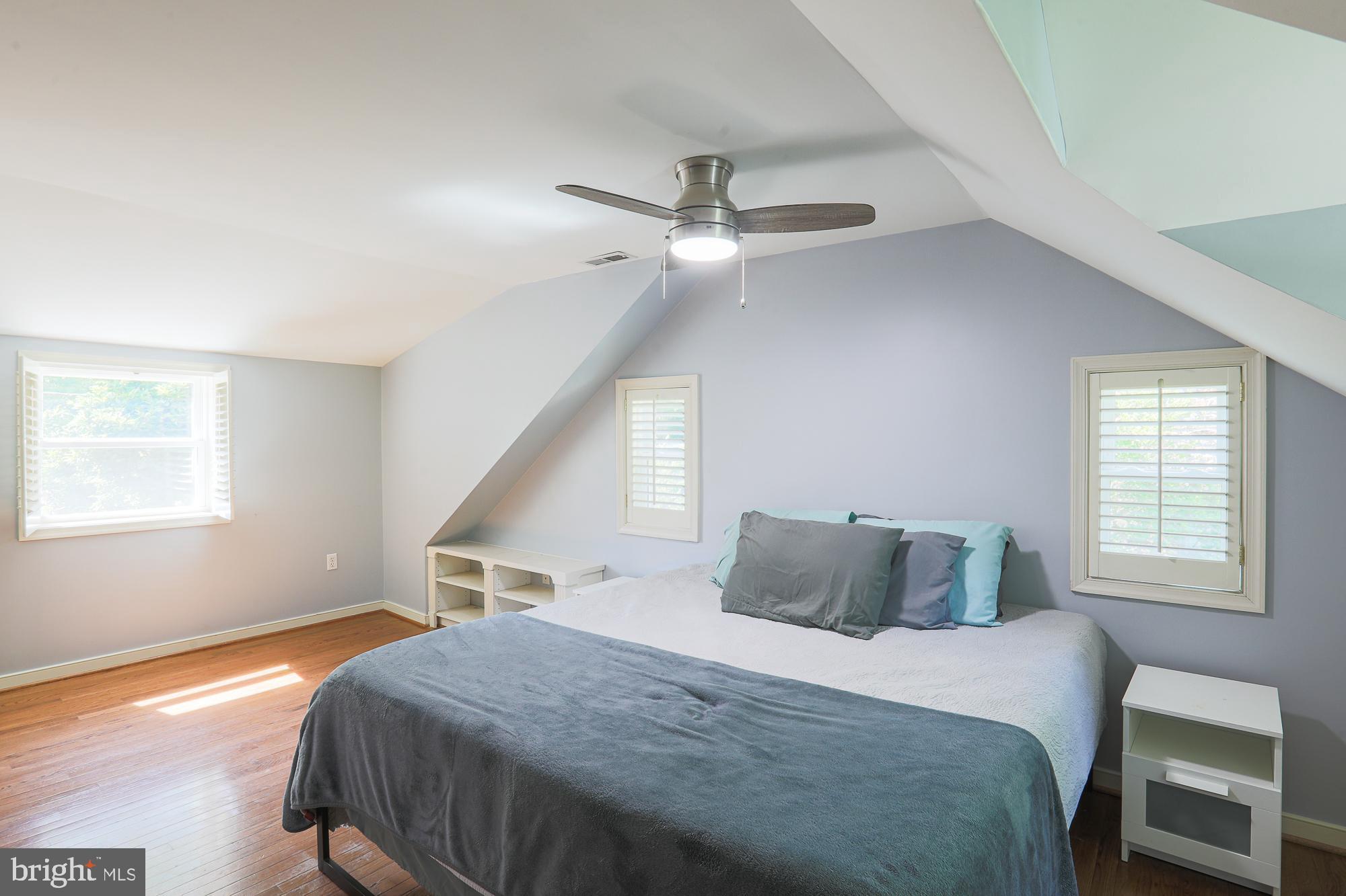 2509 Pinebrush Road Baltimore, MD 21209 - Photo 11 of 20 a bedroom with a bed and a window