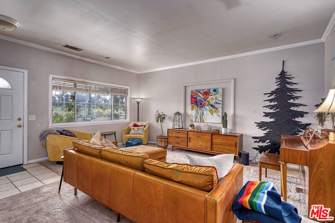 5565 Balcom Canyon Road Somis, CA 93066 - Photo 12 of 72 a living room with furniture and a large window