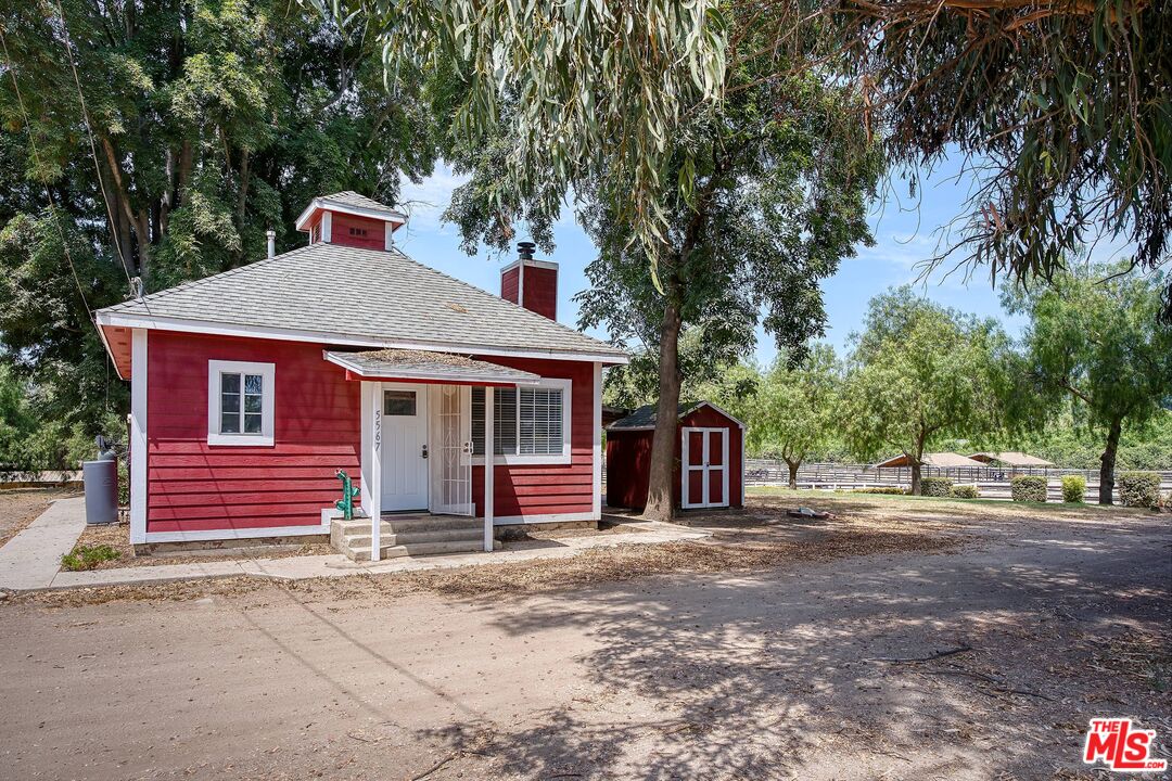 5565 Balcom Canyon Road Somis, CA 93066 - Photo 23 of 72 a front view of a house with a garden