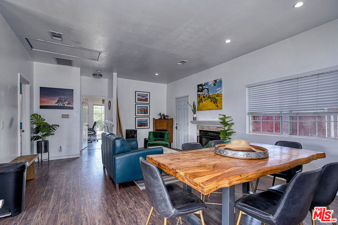 5565 Balcom Canyon Road Somis, CA 93066 - Photo 25 of 72 a view of a dining room with furniture and wooden floor