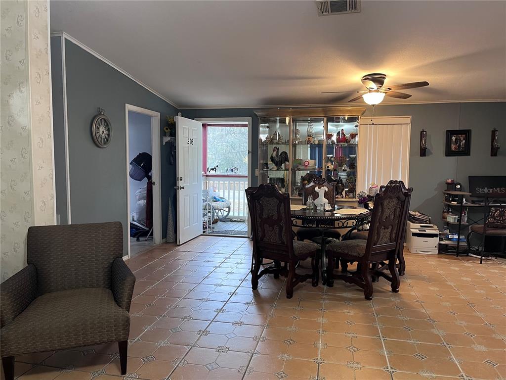 203 Vancouver Circle Interlachen, FL 32148 - Photo 20 of 25 a view of a dining room with furniture