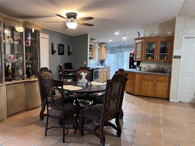a kitchen with refrigerator a washer and dryer