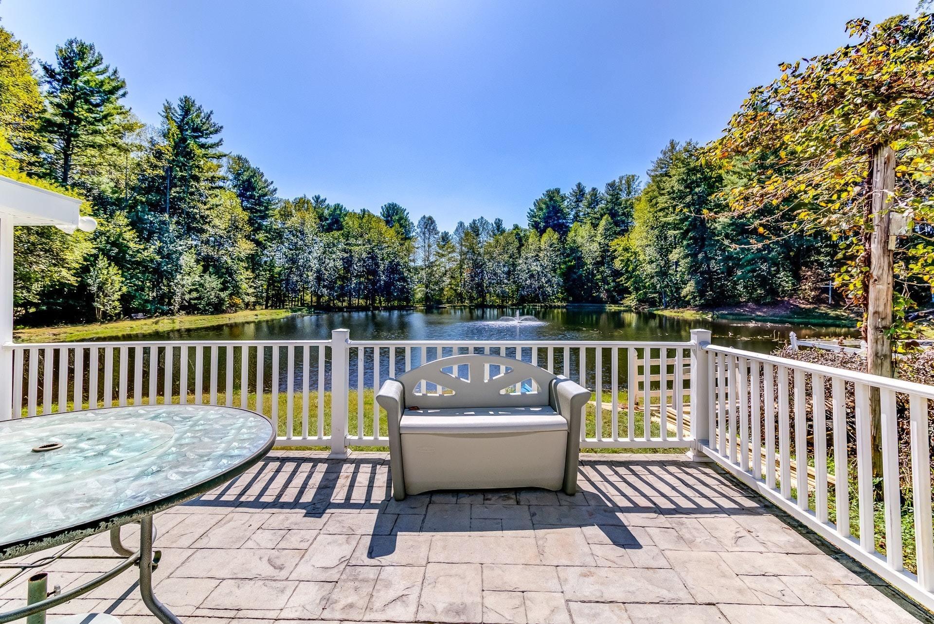 5028 Henry Road Henry, VA 24102 - Photo 11 of 44 a view of a wooden deck with furniture