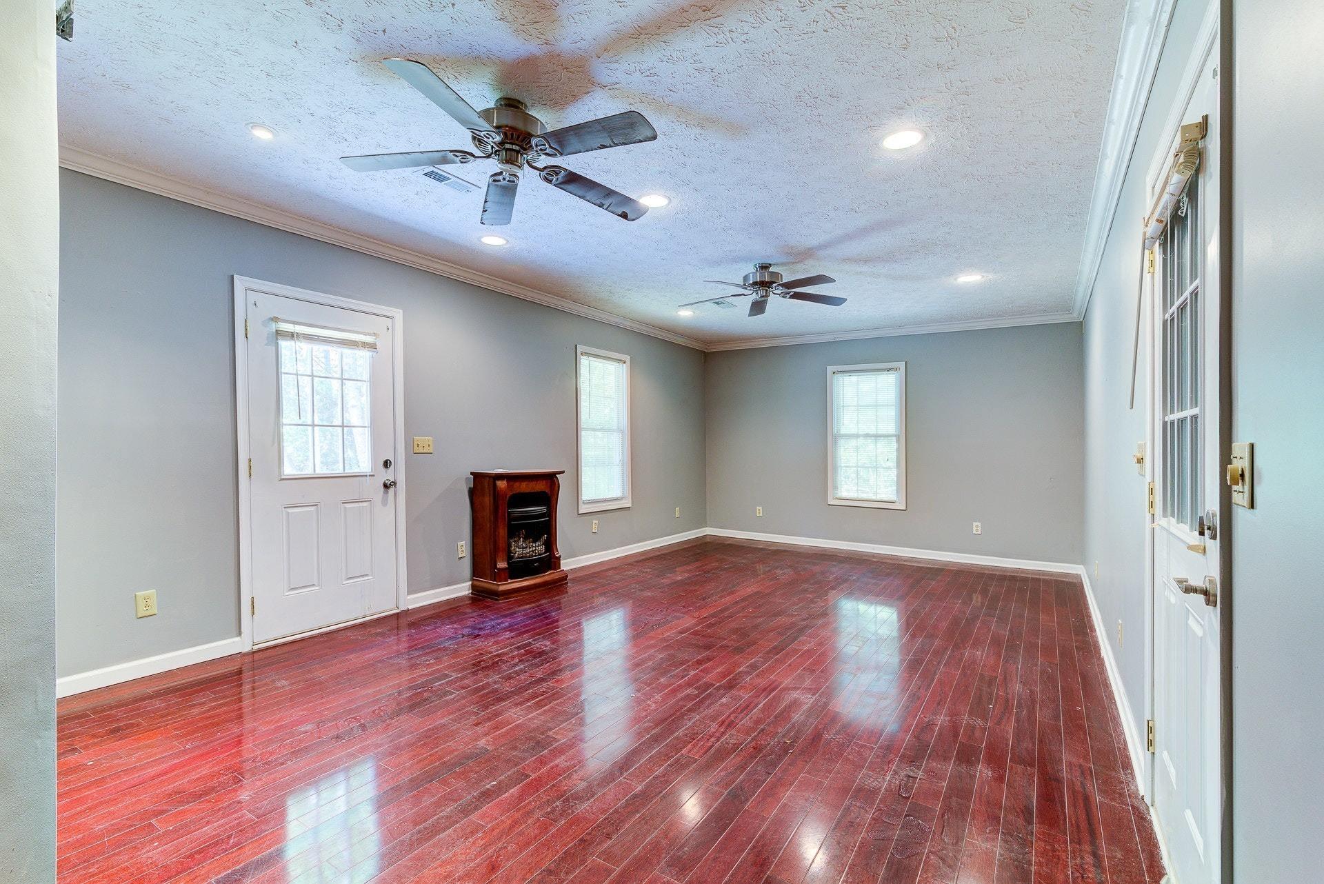 5028 Henry Road Henry, VA 24102 - Photo 16 of 44 wooden floor in an empty room with a window