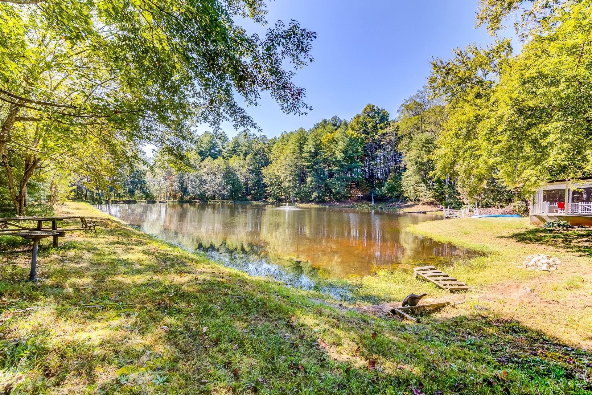5028 Henry Road Henry, VA 24102 - Photo 28 of 44 a view of a lake with houses in the back