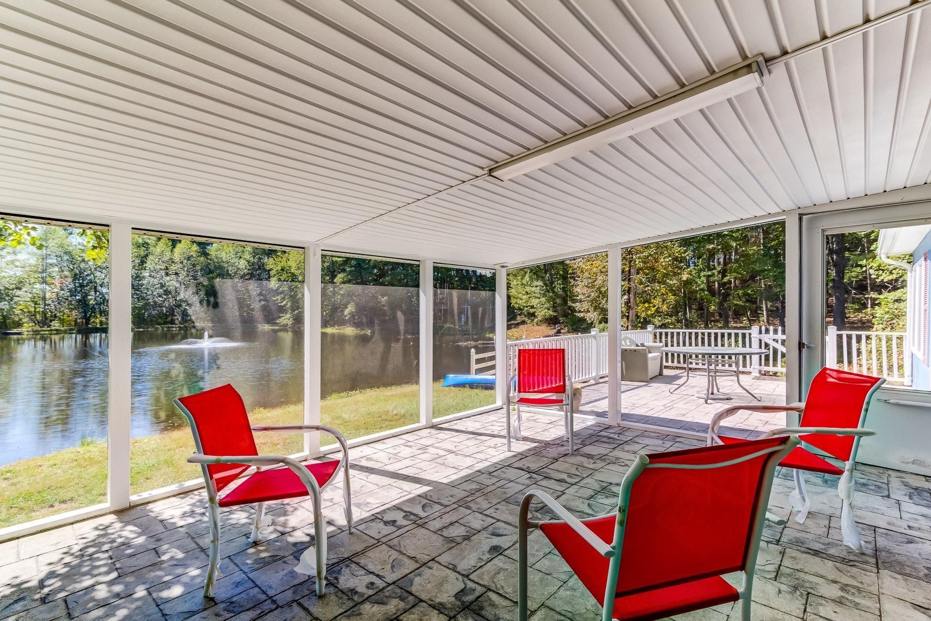 5028 Henry Road Henry, VA 24102 - Photo 30 of 44 a building outdoor space with patio furniture and glass door