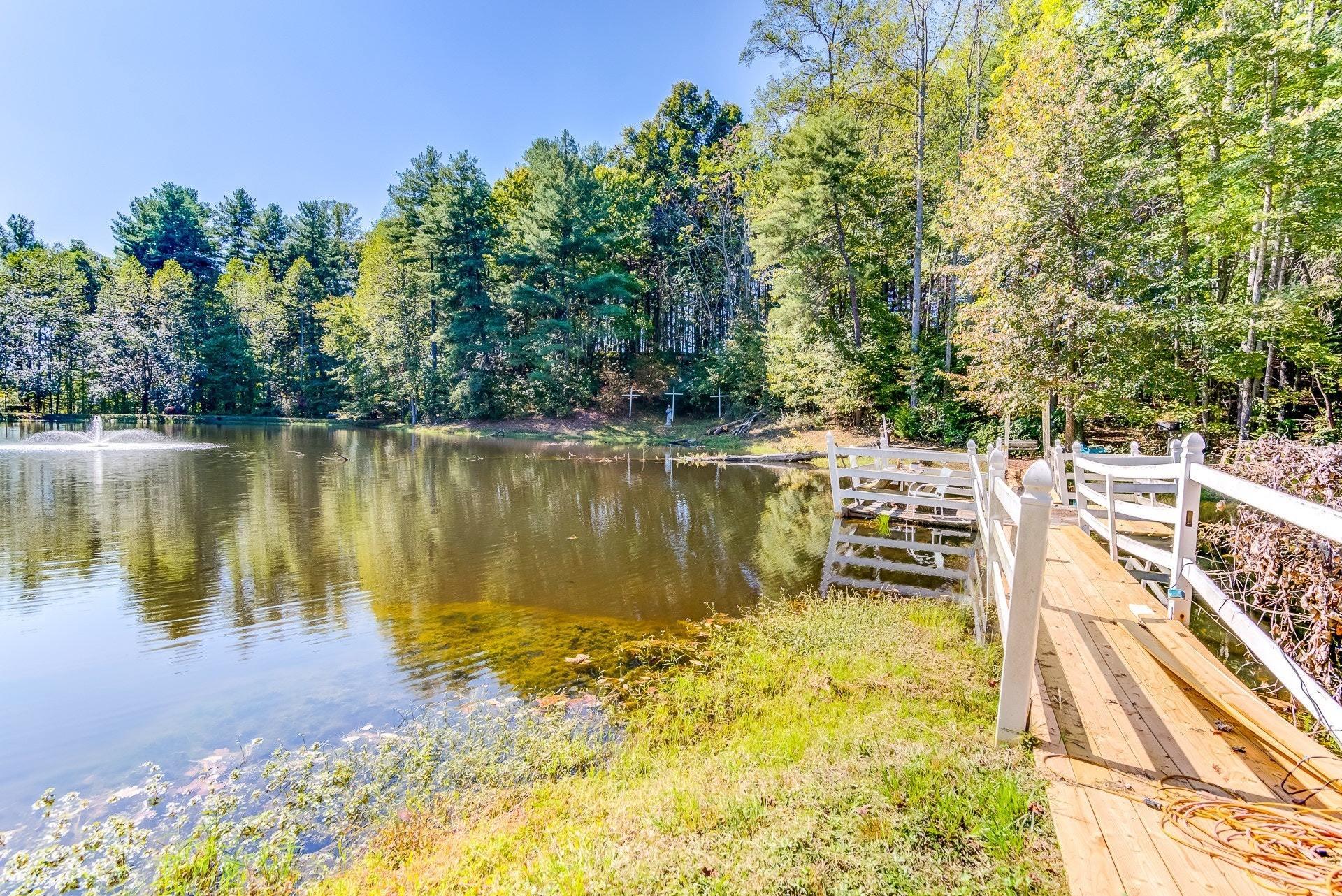 5028 Henry Road Henry, VA 24102 - Photo 36 of 44 a view of a lake with a trees