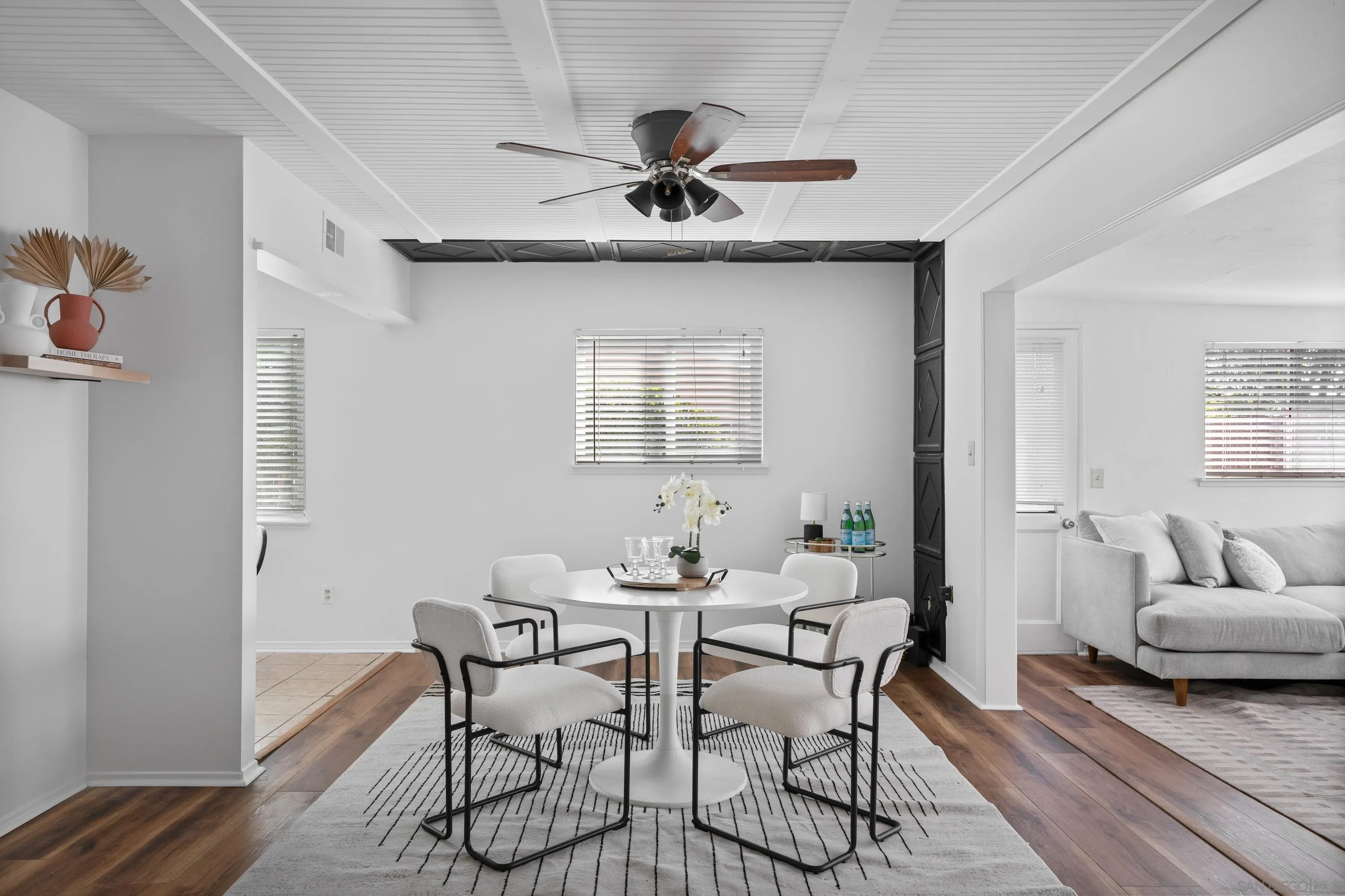 4390 Rolfe Road San Diego, CA 92117 - Photo 5 of 28 a dining room with furniture and window