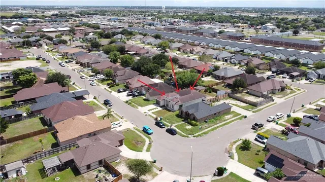 an aerial view of a city with lots of residential buildings