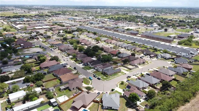 an aerial view of a city with lots of residential buildings