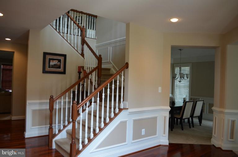 10850 Nemrod Road Perry Hall, MD 21128 - Photo 2 of 25 a view of entryway with wooden floor and stairs