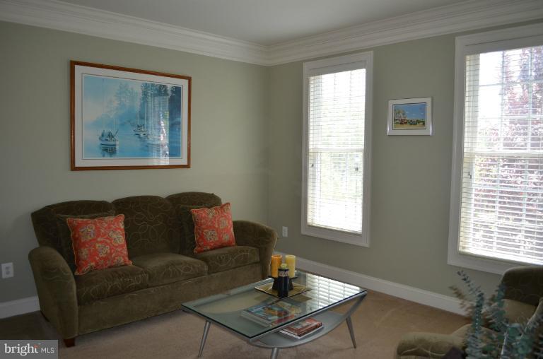 10850 Nemrod Road Perry Hall, MD 21128 - Photo 11 of 25 a living room with furniture and a window