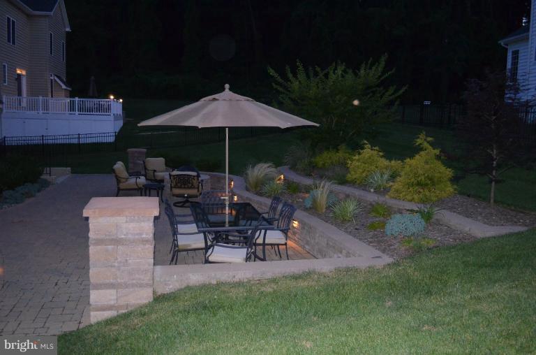 10850 Nemrod Road Perry Hall, MD 21128 - Photo 15 of 25 a patio with table and chairs