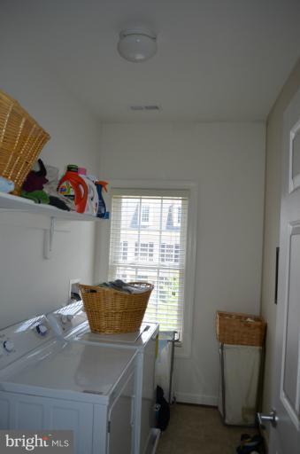10850 Nemrod Road Perry Hall, MD 21128 - Photo 7 of 25 a room with storage and utility