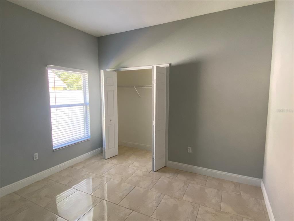 2467 Huron Circle Kissimmee, FL 34746 - Photo 15 of 26 an empty room with windows