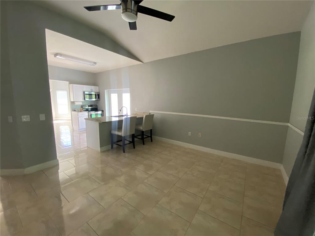 2467 Huron Circle Kissimmee, FL 34746 - Photo 9 of 26 a view of livingroom with furniture and window