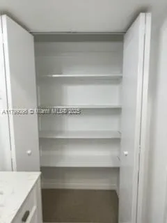 a view of a room with storage