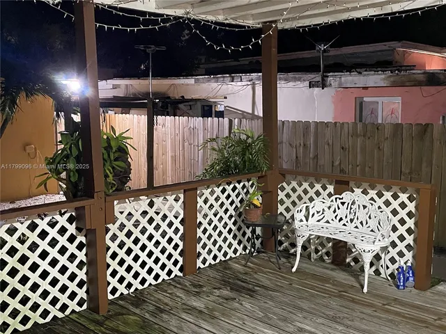 a view of a wooden fence