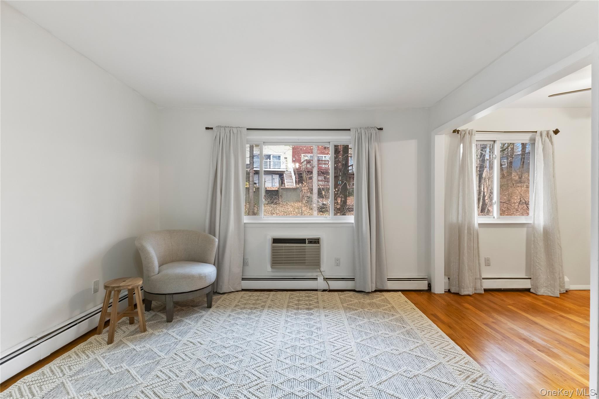 8 North James Street, Unit G Peekskill, NY 10566 - Photo 4 of 25 a bedroom with a bed and a window