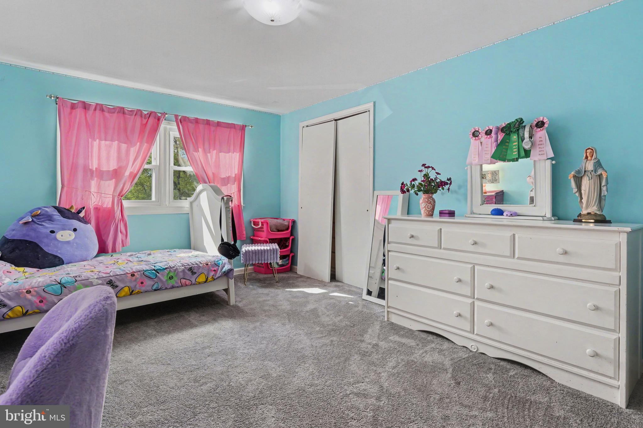 443 Woodcrest Road Wayne, PA 19087 - Photo 19 of 63 a bedroom with a bed and a window