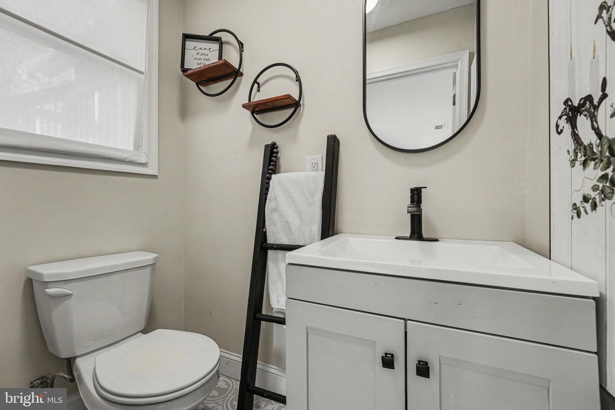 443 Woodcrest Road Wayne, PA 19087 - Photo 39 of 63 a bathroom with a toilet and a sink