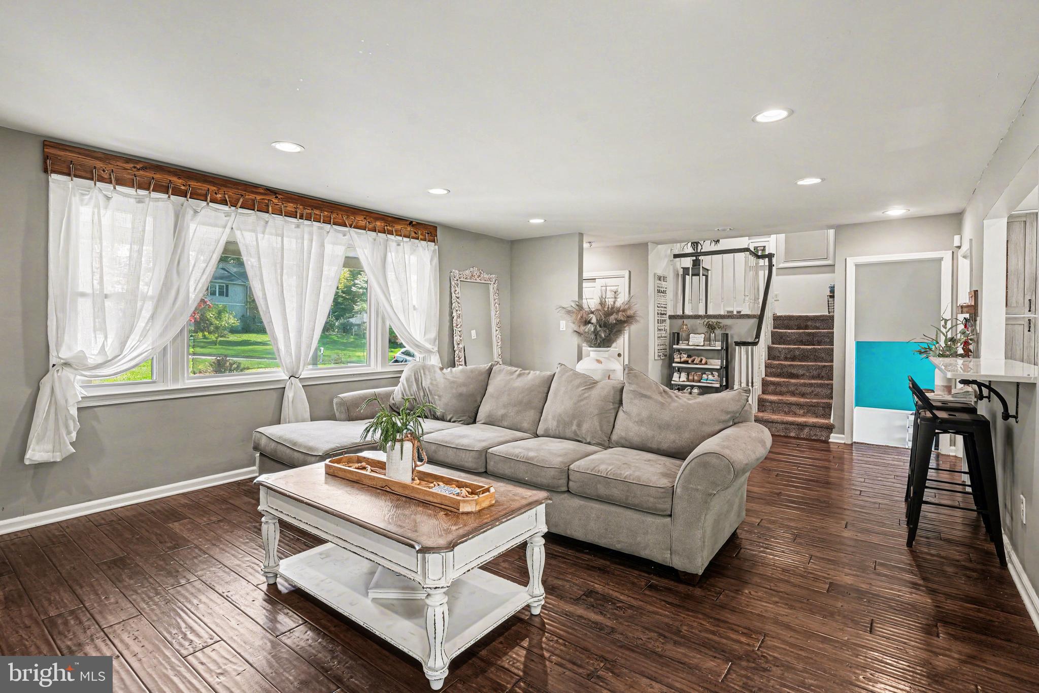 443 Woodcrest Road Wayne, PA 19087 - Photo 4 of 63 a living room with furniture and a large window
